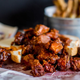 Illustration for article titled How Kansas City’s burnt ends became the ultimate barbecued meatem/em